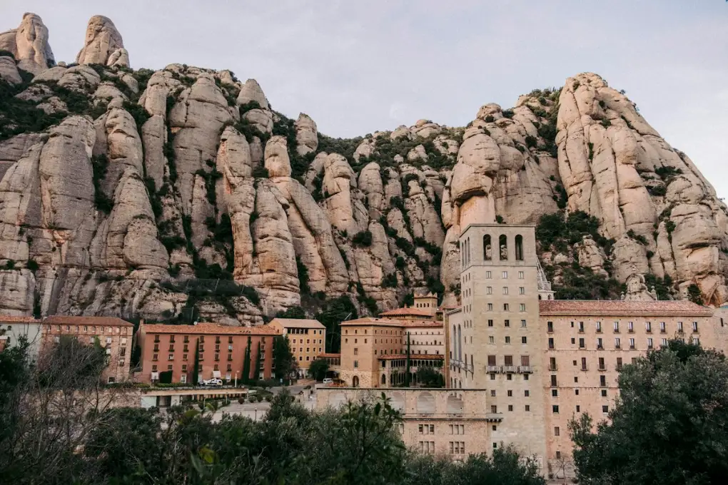 Montserrat monastery beneath the jagged mountain peaks near Barcelona
