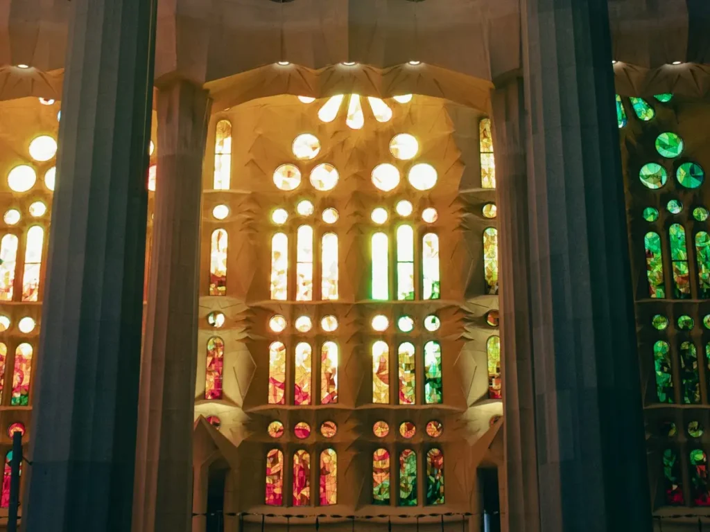 Stained glass and tree-like columns inside the basilica, seen with Sagrada Família tickets